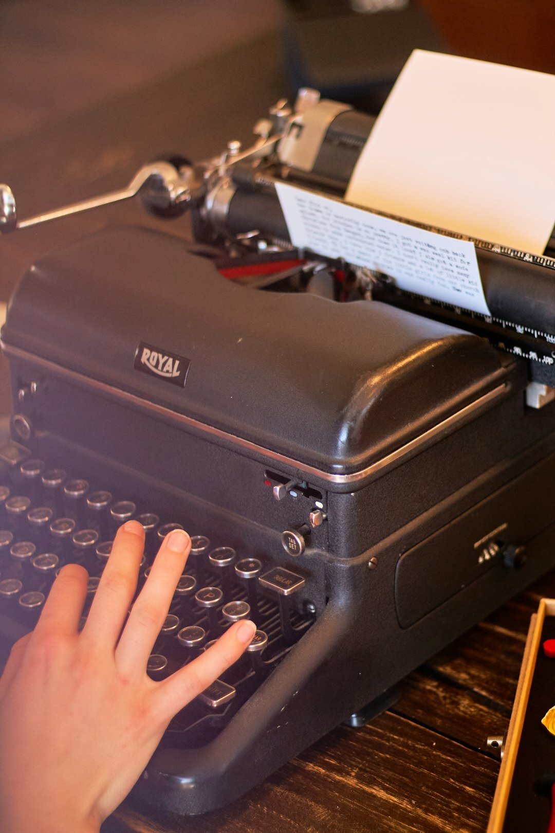 mystery author at typewriter